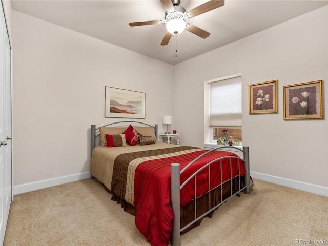 bedroom featuring a ceiling fan, baseboards, and carpet floors