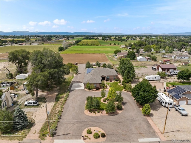 bird's eye view featuring a mountain view and a rural view