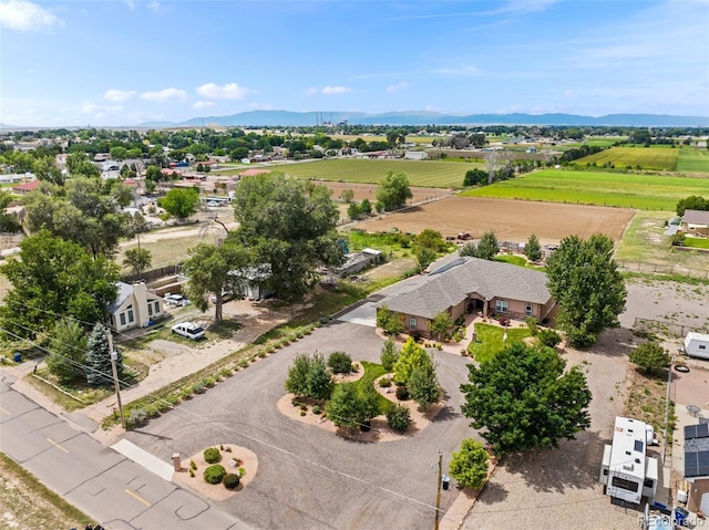 drone / aerial view featuring a mountain view