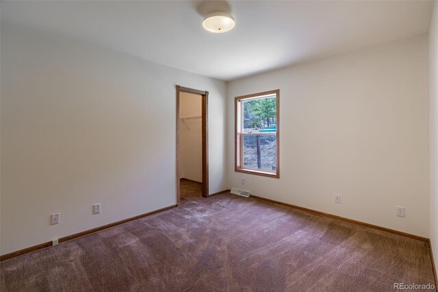 1136 Bird Point Dr, Cotopaxi, CO 81223 - carpeted empty room featuring visible vents and baseboards