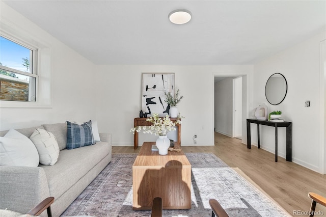 5640 Niagara St, Commerce City, CO 80022 - living area featuring wood finished floors and baseboards