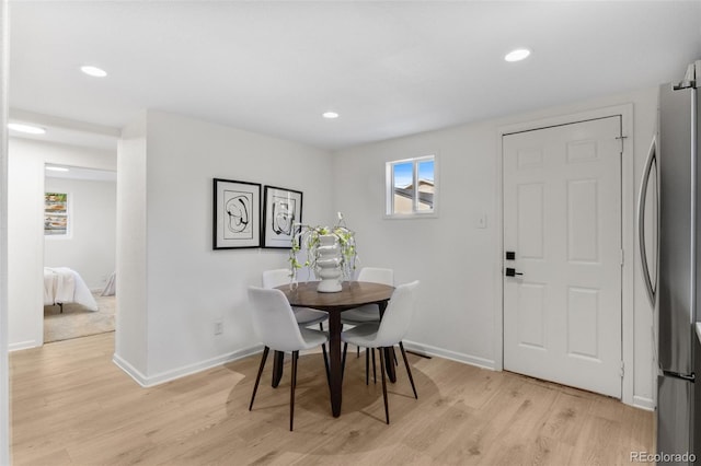 5640 Niagara St, Commerce City, CO 80022 - dining space with light wood finished floors and recessed lighting