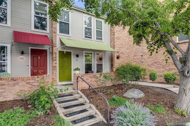1150 Inca St Unit 43, Denver, CO 80204 - townhome / multi-family property featuring brick siding