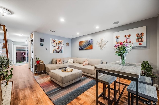 1150 Inca St Unit 43, Denver, CO 80204 - living area featuring light wood finished floors and recessed lighting