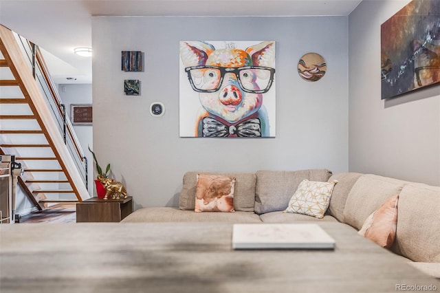 1150 Inca St Unit 43, Denver, CO 80204 - living area featuring stairs and wood finished floors