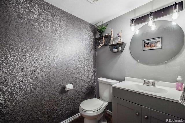 1150 Inca St Unit 43, Denver, CO 80204 - half bath featuring vanity and toilet