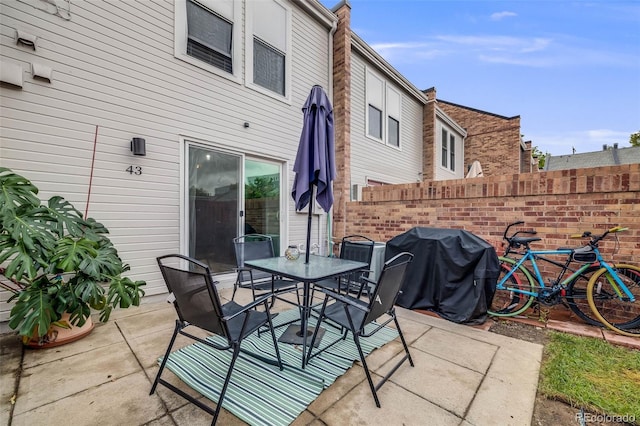 1150 Inca St Unit 43, Denver, CO 80204 - view of patio with outdoor dining space and grilling area