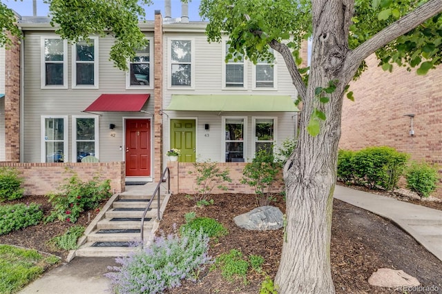 1150 Inca St Unit 43, Denver, CO 80204 - view of property with brick siding