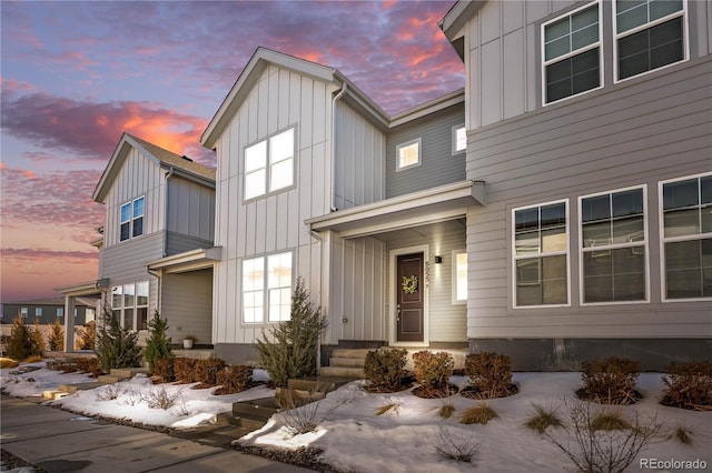 view of front facade with board and batten siding