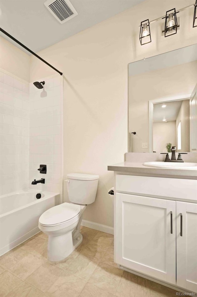 full bathroom with toilet, baseboards, visible vents, vanity, and tub / shower combination
