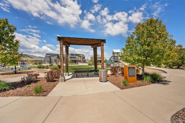 surrounding community with a pergola and playground community