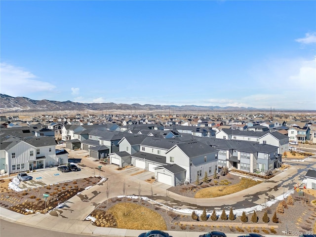bird's eye view with a mountain view and a residential view