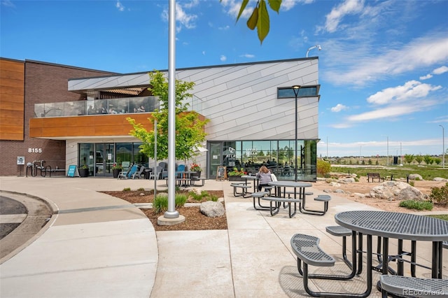 8055 Navajo River Loop Unit B, Littleton, CO 80125 - surrounding community with a patio area
