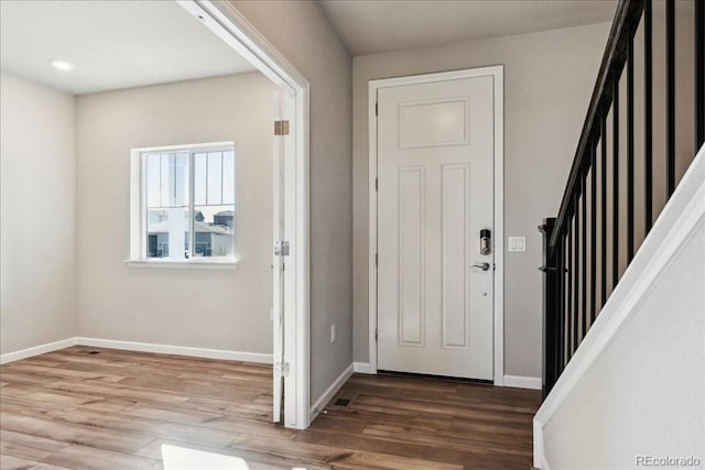 entrance foyer featuring hardwood / wood-style floors