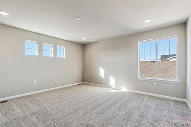 view of carpeted spare room