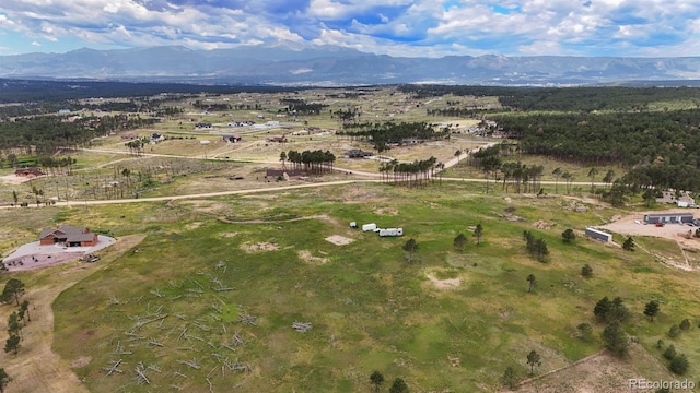 bird's eye view with a mountain view and a rural view