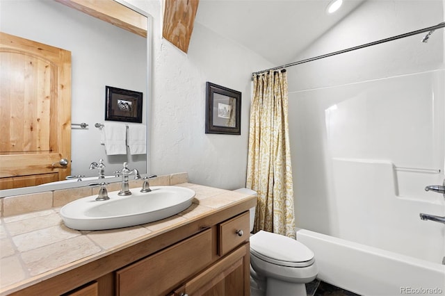200 Antler Way, Winter Park, CO 80482 - bathroom with vanity, vaulted ceiling, toilet, and shower / bath combination with curtain
