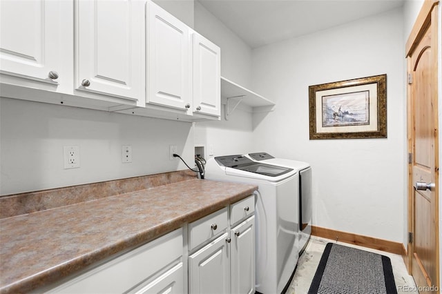200 Antler Way, Winter Park, CO 80482 - washroom featuring cabinet space, independent washer and dryer, and baseboards