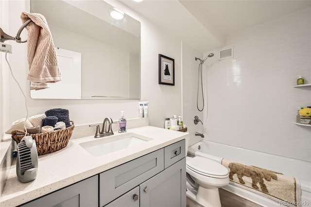 bathroom with toilet, washtub / shower combination, vanity, and visible vents