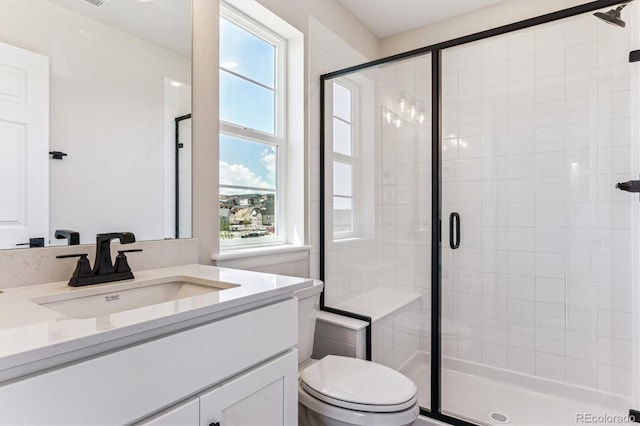 4728 Twelve Oaks Way, Castle Rock, CO 80104 - bathroom featuring vanity, a shower stall, and toilet