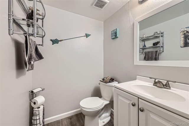 11636 Community Center Dr Unit 29, Northglenn, CO 80233 - bathroom with wood finished floors and vanity