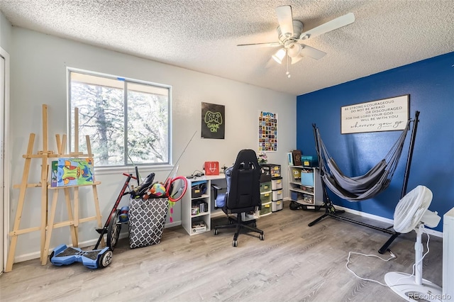11636 Community Center Dr Unit 29, Northglenn, CO 80233 - office area featuring wood finished floors, a textured ceiling, and ceiling fan