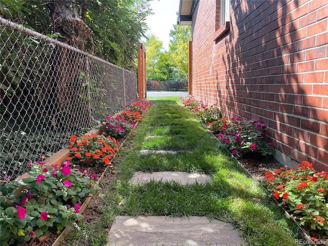 view of yard with fence