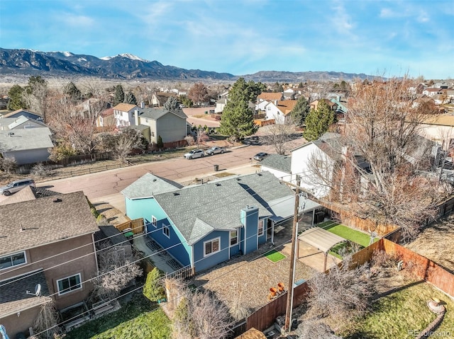 birds eye view of property featuring a mountain view