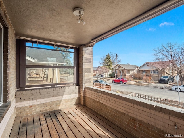 balcony featuring a residential view