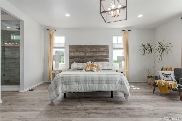 12513 Shore Point St, Firestone, CO 80504 - bedroom with multiple windows, light wood-type flooring, baseboards, and recessed lighting