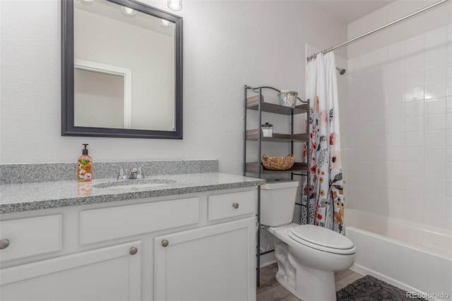 12513 Shore Point St, Firestone, CO 80504 - full bath with vanity, toilet, shower / bathtub combination with curtain, and a textured wall