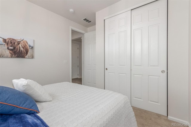 12513 Shore Point St, Firestone, CO 80504 - bedroom with light carpet, a closet, and baseboards