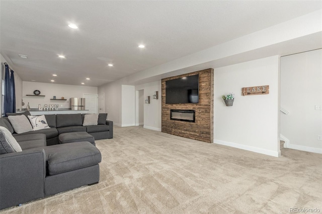 12513 Shore Point St, Firestone, CO 80504 - living room featuring light carpet, a fireplace, baseboards, and recessed lighting