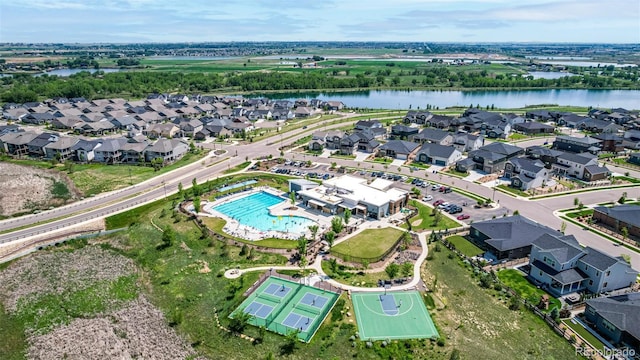 12513 Shore Point St, Firestone, CO 80504 - aerial view of residential area featuring a large body of water and a pool