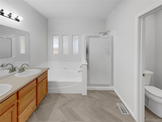 full bathroom featuring vanity, separate shower and tub, parquet floors, and toilet