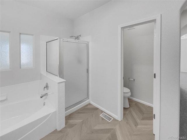 bathroom with parquet flooring, toilet, and independent shower and bath