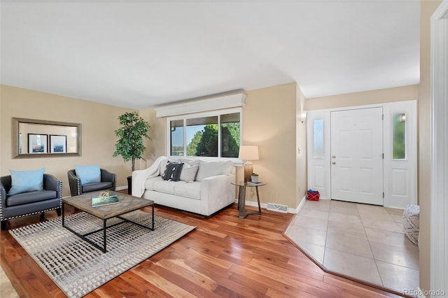 living room with light hardwood / wood-style floors