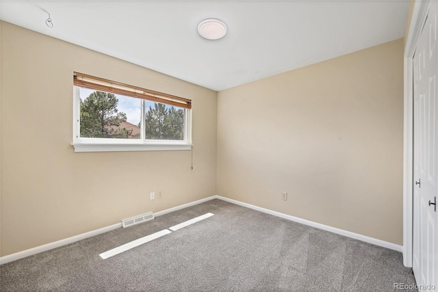 spare room with carpet flooring