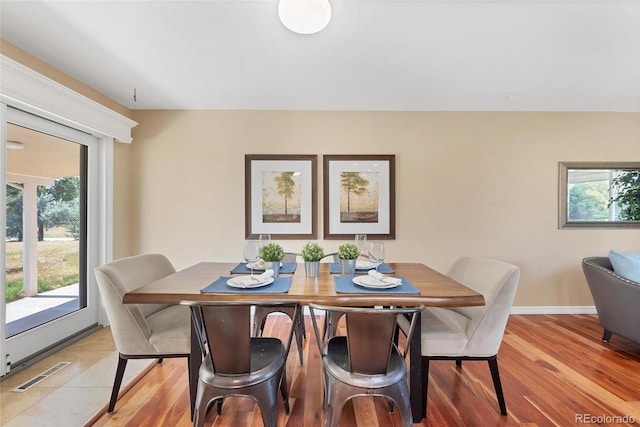 dining room featuring light wood-type flooring