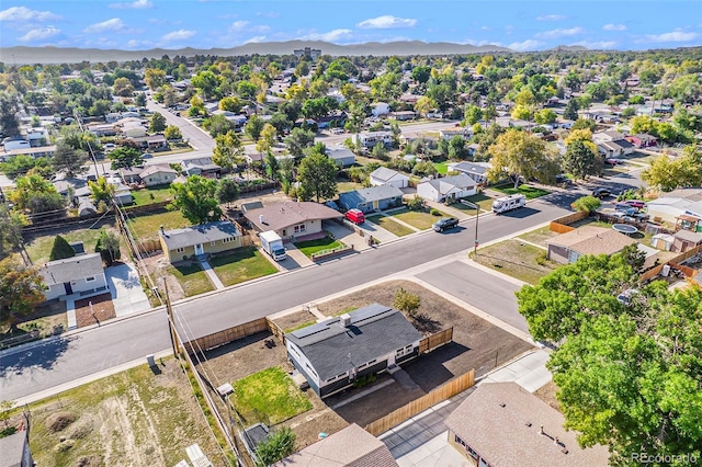 drone / aerial view with a residential view and a mountain view