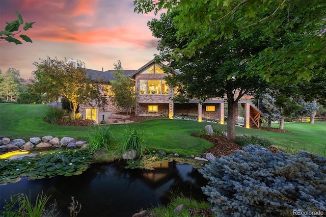 yard at dusk with a lawn