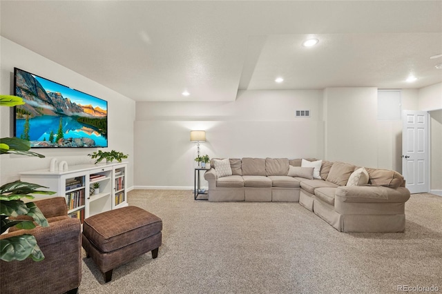 carpeted living room featuring recessed lighting, visible vents, and baseboards