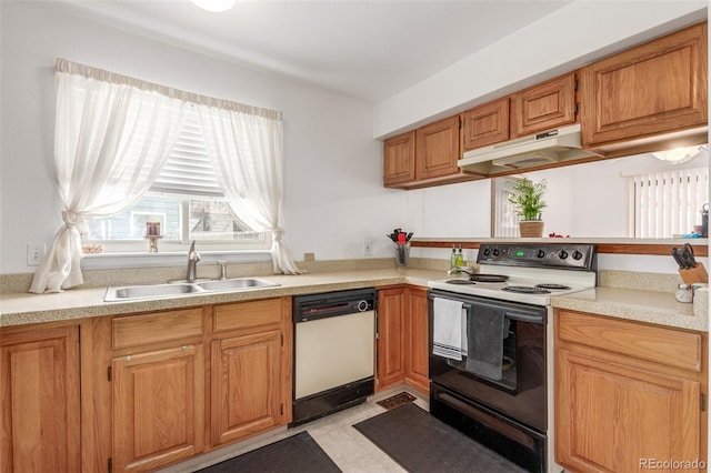 kitchen featuring range with electric cooktop, under cabinet range hood, dishwasher, light countertops, and a sink