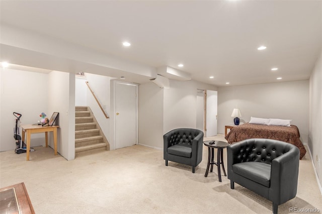 living area featuring carpet flooring, recessed lighting, and stairway