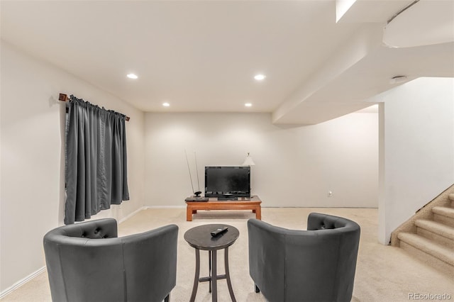 living room with stairs, recessed lighting, baseboards, and light carpet