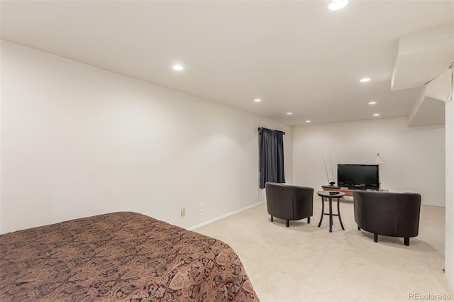 bedroom featuring recessed lighting, baseboards, and light carpet