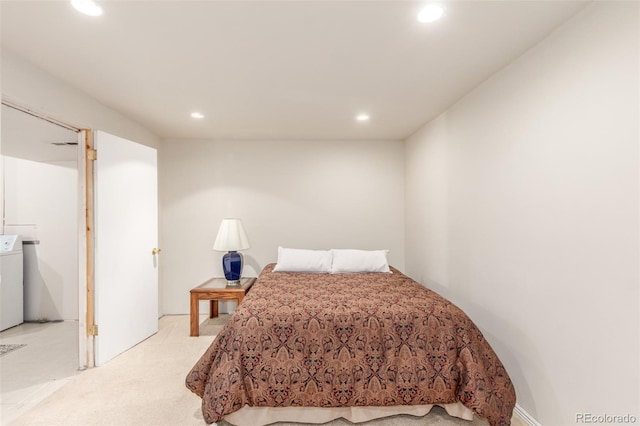 bedroom featuring washer / dryer, recessed lighting, visible vents, and light carpet