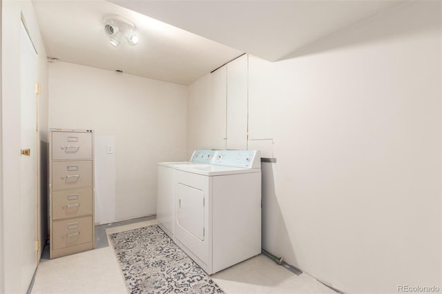 washroom featuring laundry area and independent washer and dryer