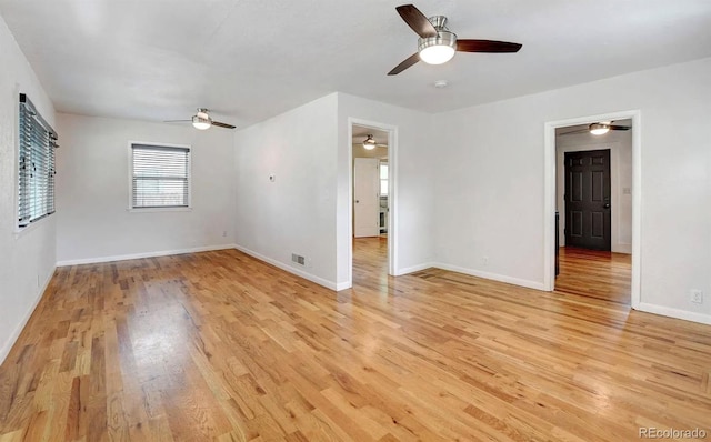 empty room with light hardwood / wood-style floors