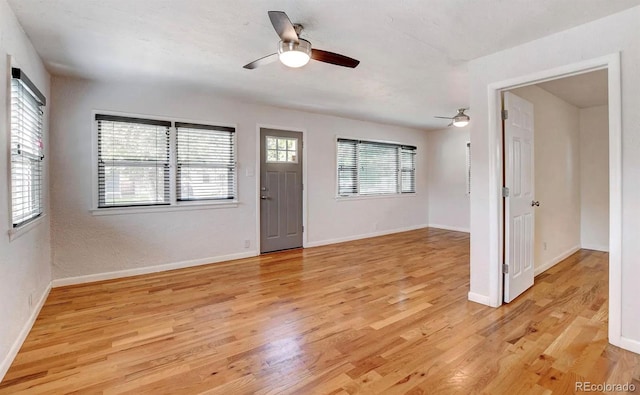 foyer featuring light hardwood / wood-style flooring and ceiling fan